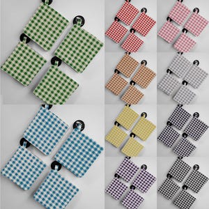May include: A set of 10 fabric squares with a gingham pattern in various colors, including green, blue, red, yellow, orange, black, and purple. Each square has a small loop at the top for hanging.