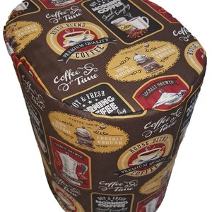 May include: A brown and red coffee themed fabric cover with various coffee-related illustrations and text, including "Coffee & Time", "Hot & Fresh Morning Coffee", "Premium Quality Coffee", and "House Blend".