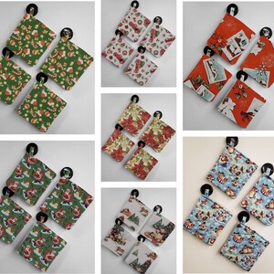 May include: Set of 10 Christmas-themed fabric squares with various designs. The squares feature a variety of holiday motifs, including Santa Claus, reindeer, snowmen, and Christmas trees. The squares are made of a soft, cotton fabric and are perfect for crafting projects, such as making ornaments, gift tags, or holiday decorations.