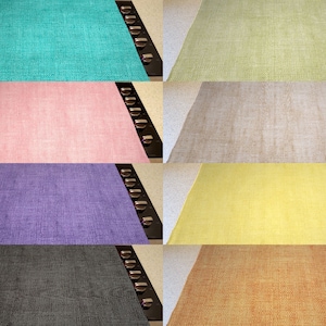May include: Eight samples of fabric swatches in different colors and textures. The swatches are arranged in two rows of four, with each swatch lying on a black surface. The colors are teal, light green, pink, beige, purple, yellow, gray, and orange.
