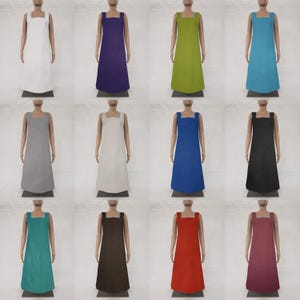 May include: Twelve different colored aprons with a simple design. The aprons are all sleeveless and have a single strap that goes over the shoulder. The aprons are made of a variety of fabrics, including cotton, linen, and denim.