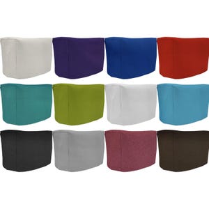 May include: A collection of twelve rectangular fabric covers in various colors. The colors include white, purple, blue, red, teal, green, another white, light blue, black, gray, maroon, and brown. The covers are likely for furniture or equipment.