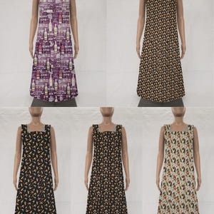 May include: Six sleeveless dresses with different patterns. The dresses are all long and have a simple, casual style. The patterns include wine bottles, skulls, and other abstract designs.