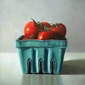 This artwork features a turquoise plastic basket filled with plump red tomatoes resting on a light reflective surface.