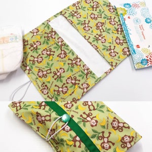 Waterproof Grab n go diaper clutch great for new and experienced moms. Perfect Baby Shower Gift Monkeys