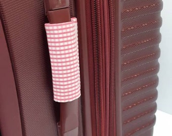 Luggage Identifiers that velcro around the handle. Great to identify  your suitcase at the airport, camera case, school instrument and more