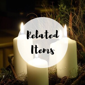 May include: Four white candles are lit and arranged in a circle on a bed of pine needles and pinecones. The candles are surrounded by a white circle with the text "Related Items" in black.