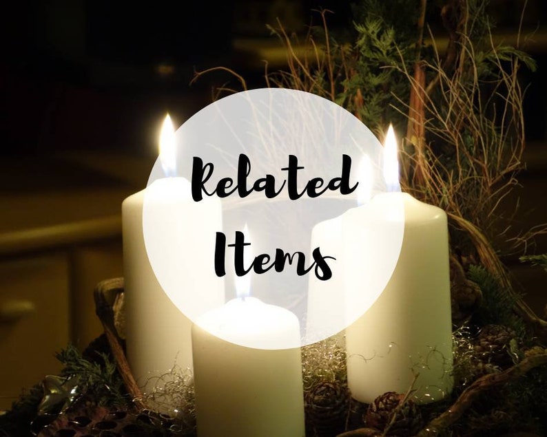 May include: Four white candles are lit and arranged in a circle on a bed of pine needles and pinecones. The candles are surrounded by a white circle with the text "Related Items" in black.