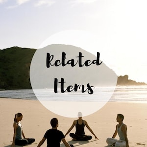 May include: Four individuals sit in a cross-legged meditation pose on a sandy beach near the ocean. A large, semi-transparent white circle is overlaid in the center of the image, featuring the black text Related Items written in a script font.