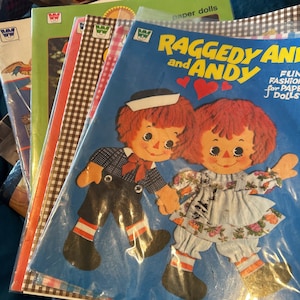 Fabulous Assortment of Paper Doll Catalogs from Yesteryear Including Wizard of Oz, Shirley Temple, Pippi Longstocking, Raggedy Ann and More