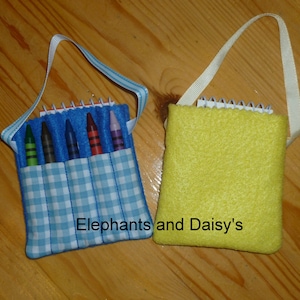 May include: Two small fabric bags with a blue and white checkered pattern and a solid yellow pattern. Each bag has a zipper closure and a loop handle. The blue and white bag contains a set of crayons. The yellow bag has the text "Elephants and Daisy's" printed on the front.