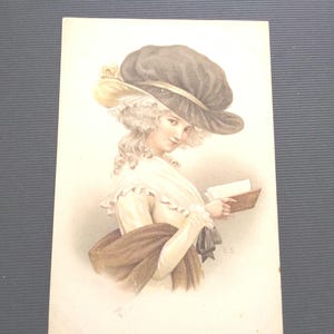 Jeune femme E S Signature C W Faulkner & Co Series No 1077B Carte postale non utilisée