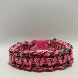 Pink with green 7.25” Paracord bracelet