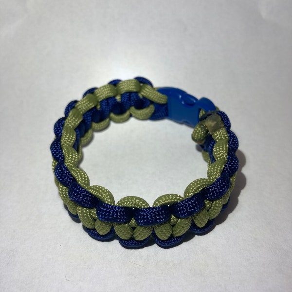 Army green with navy 7.25” Paracord bracelet with blue buckle