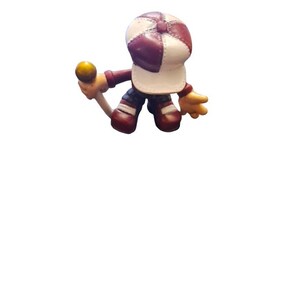 May include: A small, red and white figurine of a person wearing a hat and holding a microphone. The figurine is made of plastic and has a cartoonish style.