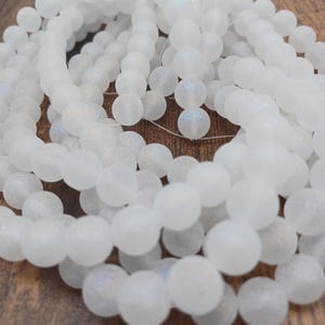 White Frosted 10mm Glass Beads. (1 strand) (38 beads)