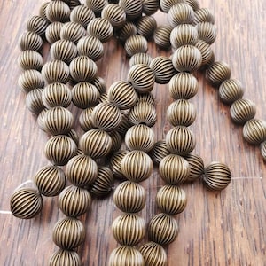 Raw Brass Corrugated 12mm Round Bead (26 Pieces)