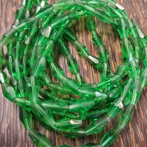 Emerald Bohemian Glass 12mm x 6mm Lantern Beads. (1 strand) (33 beads)