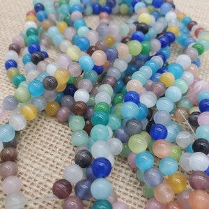 1 strand 6mm multi Cats Eye Fiber Optic Beads (approximately 68 beads)