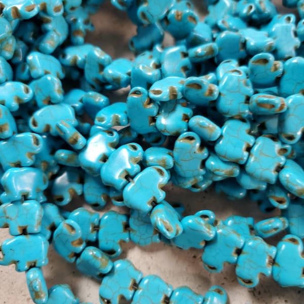 Turquoise Howlite Carved Elephant Beads (1 strand = 39 Pieces)