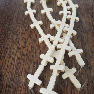 30mm cream color cross howlite stone beads (1 strand)