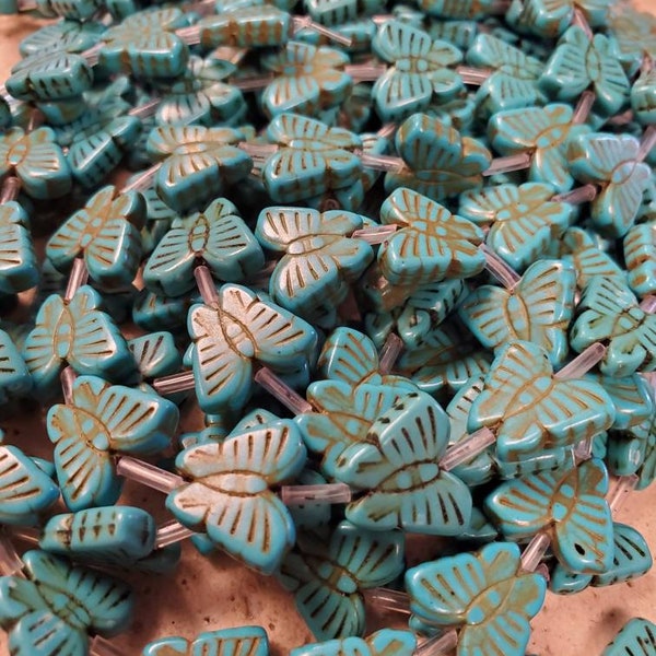 Turquoise 12mm butterfly howlite stone beads (1 strand = 25 Beads)