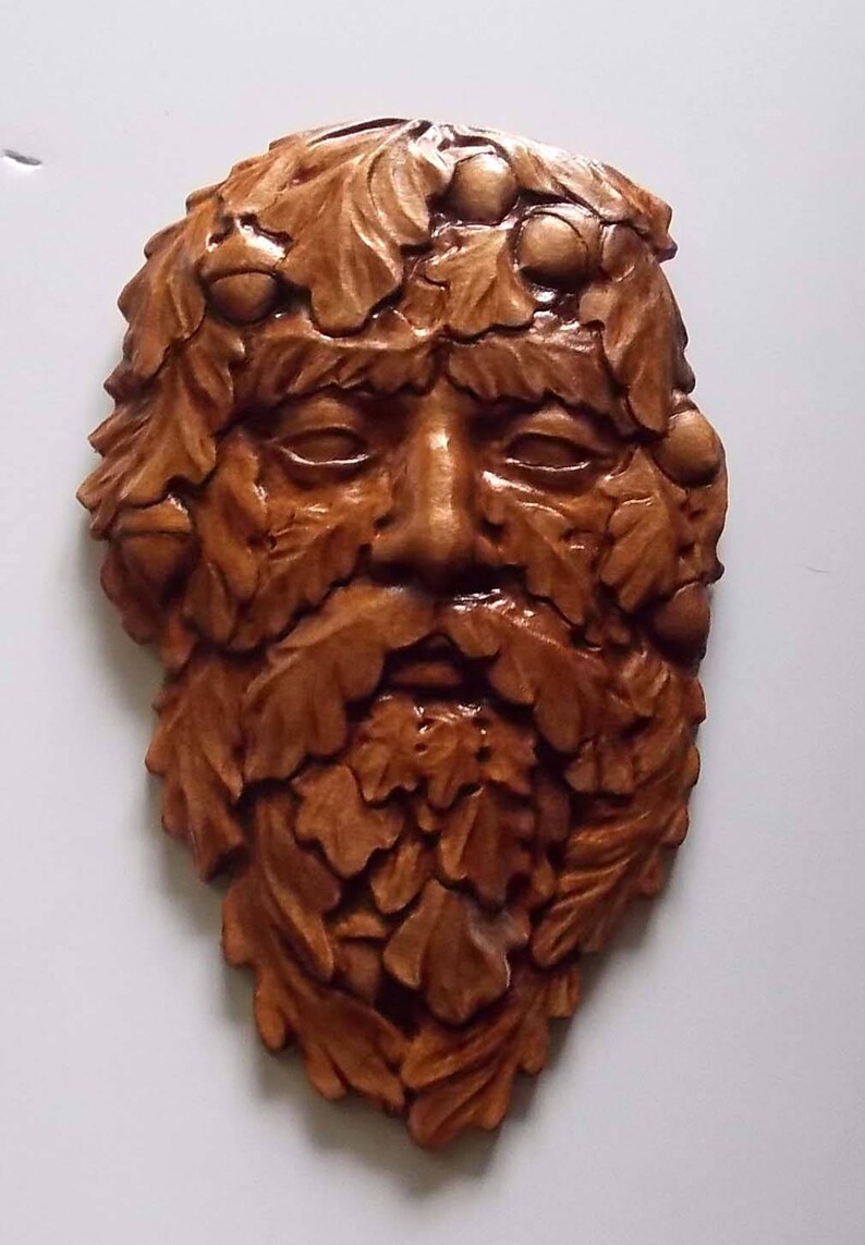 green man plaque wood