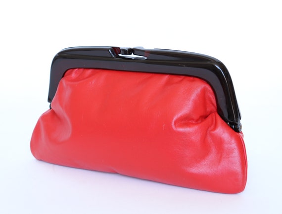 red leather clutch bag
