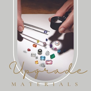 May include: A variety of colorful gemstones and a pearl are scattered on a white surface. A magnifying glass and tweezers are used to examine the gems. The text "Upgrade Materials" is written in gold script at the bottom of the image.