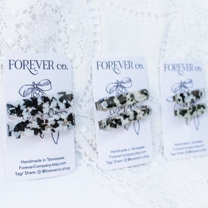 May include: Three sets of black and white patterned hair clips on white cards with the text "FOREVER CO." printed on them. The cards also include the text "Handmade in Tennessee" and "ForeverCompany.etsy.com".