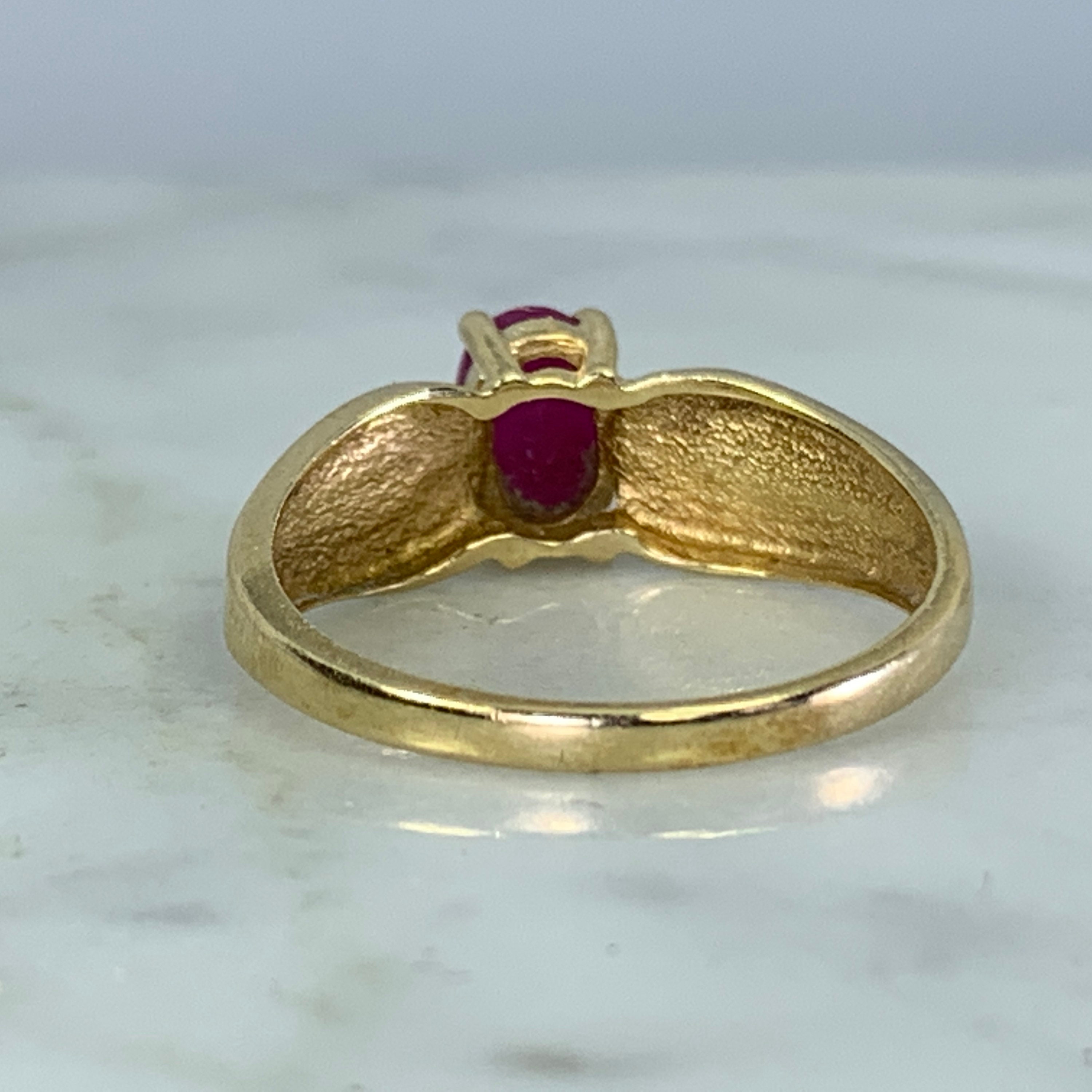 Vintage 1970s Ruby Solitaire Ring set in 14K Yellow Gold