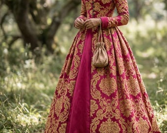 May include: A floor-length dress featuring a vibrant magenta base with an intricate gold damask pattern. The garment has long sleeves, a high collar, a button-down front, and a full skirt. A small, light tan drawstring pouch hangs from the waist.