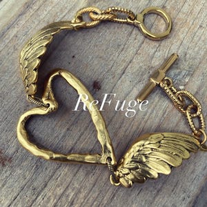 Pulsera artesanal de corazón alado, estilo bohemio, hippie y gitano.