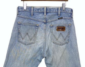 Pantalones vaqueros acampanados Wrangler W33 L26, de mezclilla desgastada
