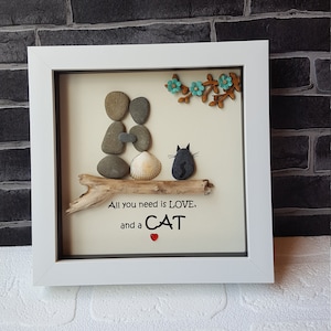 Beautiful &quot;All you need is love, and a cat&quot; pebble art, lady with her pet natural rocks