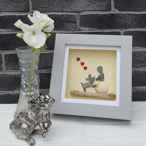 Handmade Pebble Art in Grey Frame, Showing a Lady or Girl Sitting with her Pet Dog