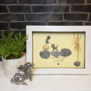Beautiful &quot;All you need is love, and a cat&quot; pebble art, lady with her pet natural rocks