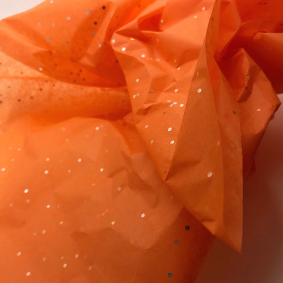 Papier de soie orange en feuilles