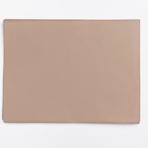 May include: A light brown rectangular piece of paper.