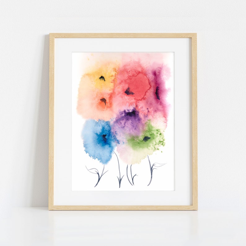 May include: A framed watercolor painting of a bouquet of colorful flowers. The flowers are painted in shades of red, orange, yellow, green, blue, and purple. The flowers are surrounded by a white background.