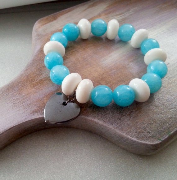 Items similar to Blue jade stone and white coral stretch bracelet ...