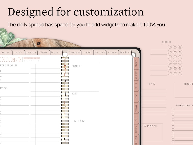 Designed for customization. The daily spread has space for you to add widgets and make it 100 percent you. Digital planning widgets are shown beside the planner which is open to the daily spread page.