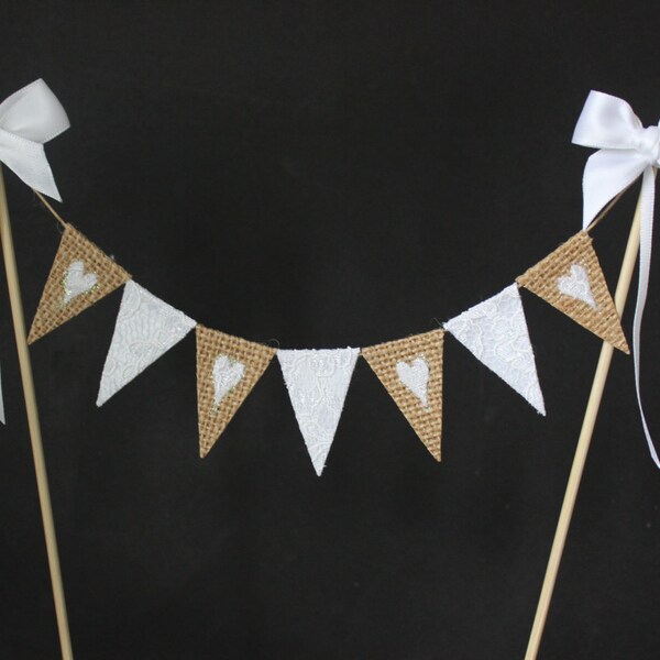 Wedding cake topper in a rustic style of cake banner made from hessian and lace mini bunting