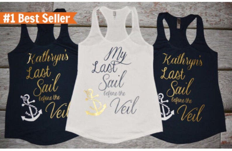 May include: Three tank tops with gold lettering and an anchor graphic. The text on the white tank top reads "My Last Sail Before the Veil". The text on the two navy blue tank tops reads "Kathryn's Last Sail Before the Veil".