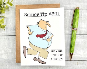 May include: A humorous greeting card featuring a cartoon illustration of a man running away. The card reads "Senior Tip #391 Never Trust A Fart!"