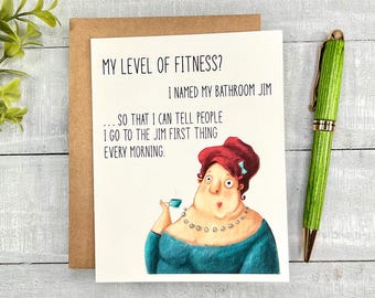 May include: A humorous greeting card featuring a cartoon illustration of a woman holding a cup of tea. The card reads "My level of fitness? I named my bathroom Jim... so that I can tell people I go to the Jim first thing every morning."
