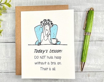 May include: A humorous greeting card with a cartoon illustration of a woman with a cup of coffee. The text reads "Today's Lesson: DO NOT hula hoop without a bra on. That is all."