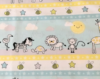 May include: A blue and white fabric with a repeating pattern of animals, including a giraffe, elephant, zebra, lion, monkey, turtle, and flamingo. The fabric also features yellow stars, bees, and clouds.