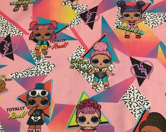 Robert Kaufman  - Totally Awesome 100% Cotton Doll Fabric on Pink background - by the 1/2 yard