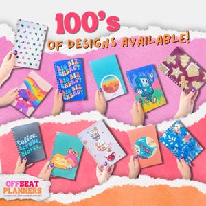 May include: A collection of colorful notebooks with various designs, including a rainbow, a cityscape, and a retro video game character. The text "100's OF DESIGNS AVAILABLE!" is displayed at the top. The notebooks are held by hands against a pink background.